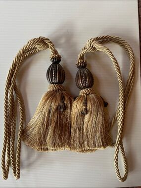 Pair of Gold Braided Cord Drapery Tiebacks
 Carved Ornamental Barrel Beads